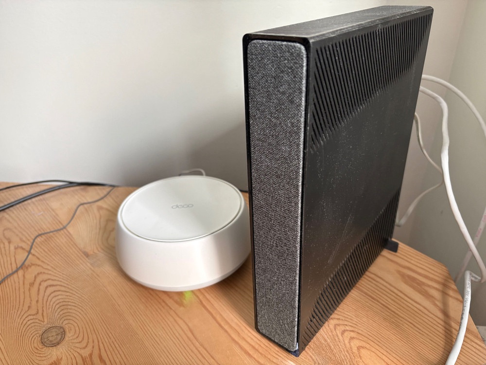 I connected the first Deco mesh unit to my router using an ethernet cable that comes with the bundle (Jake Brigstock, The Independent)