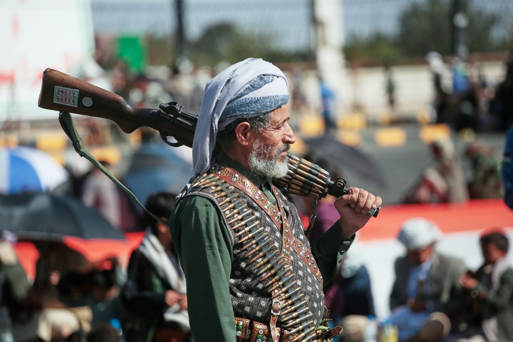 A supporter of Yemen's Houthi rebels carries his rifle during a rally in support of the group, in Sanaa, Yemen (Copyright 2026 The Associated Press. All rights reserved)