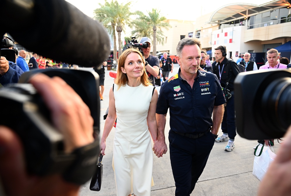 Horner strides into the Bahrain paddock hand-in-hand with Geri in 2024 (Getty)
