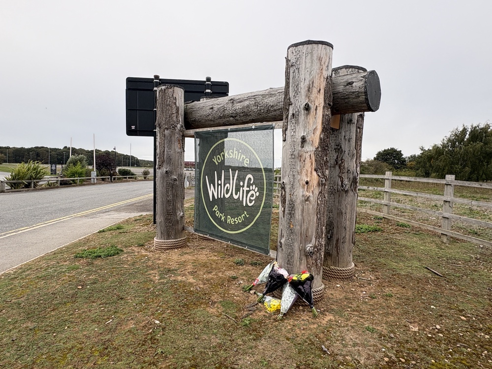 Flowers were left at the entrance of Yorkshire Wildlife Park (Dave Higgens/PA) (PA Wire)