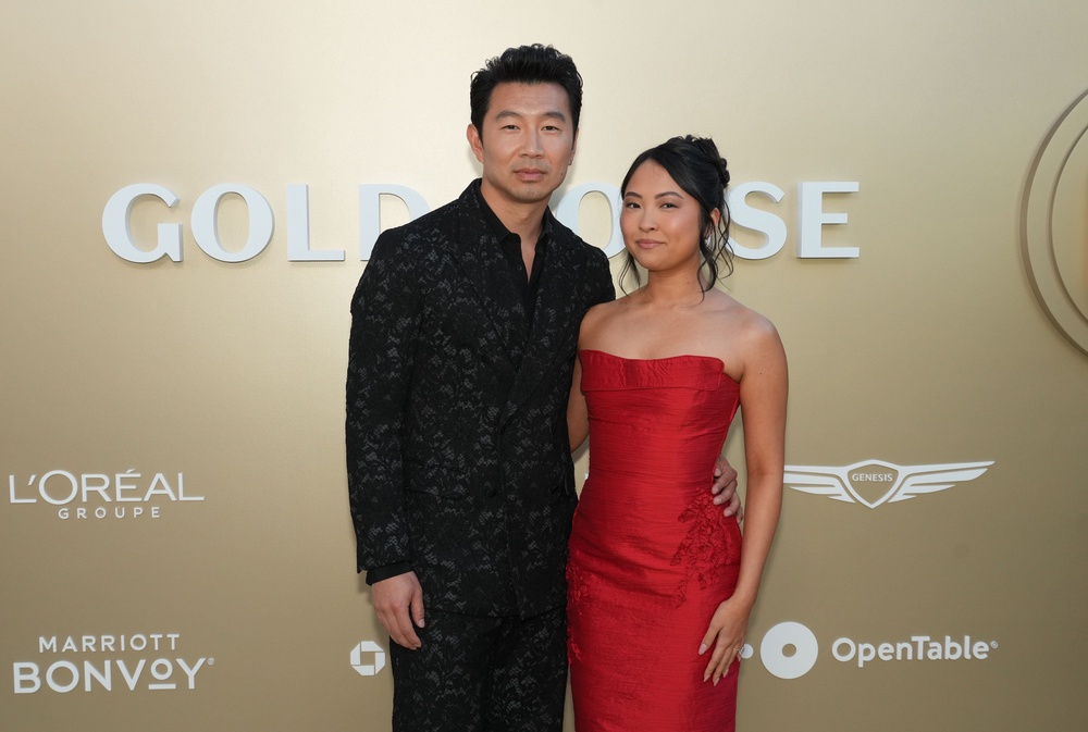 Simu Liu and Allison Hsu arrive at the Gold House 5th Annual Gold Gala (Getty)
