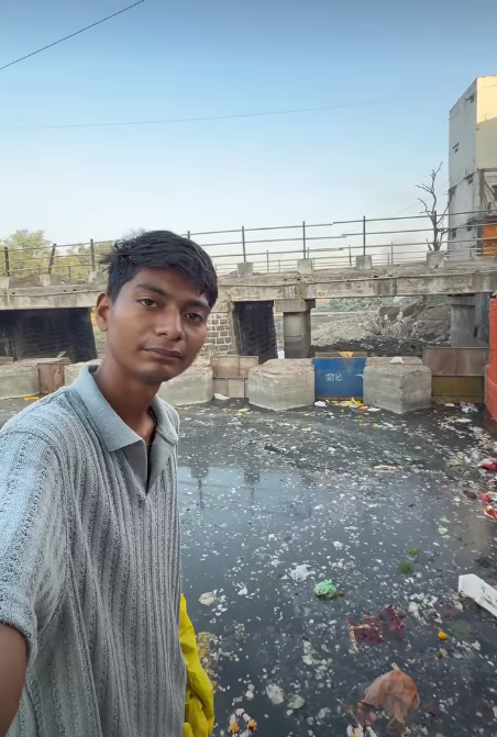 In the video, one can see the water dotted with plastic, discarded cloth, and flowers (Surendra singh choudhry/Instagram)