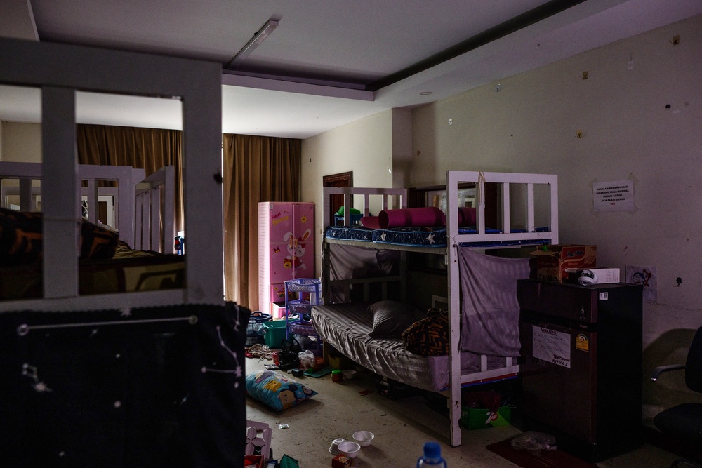 Personal belongings are left in the living quarters of an abandoned scam centre in O'Smach town on the Thai-Cambodian border, on September 7, 2026 (AFP/Getty)