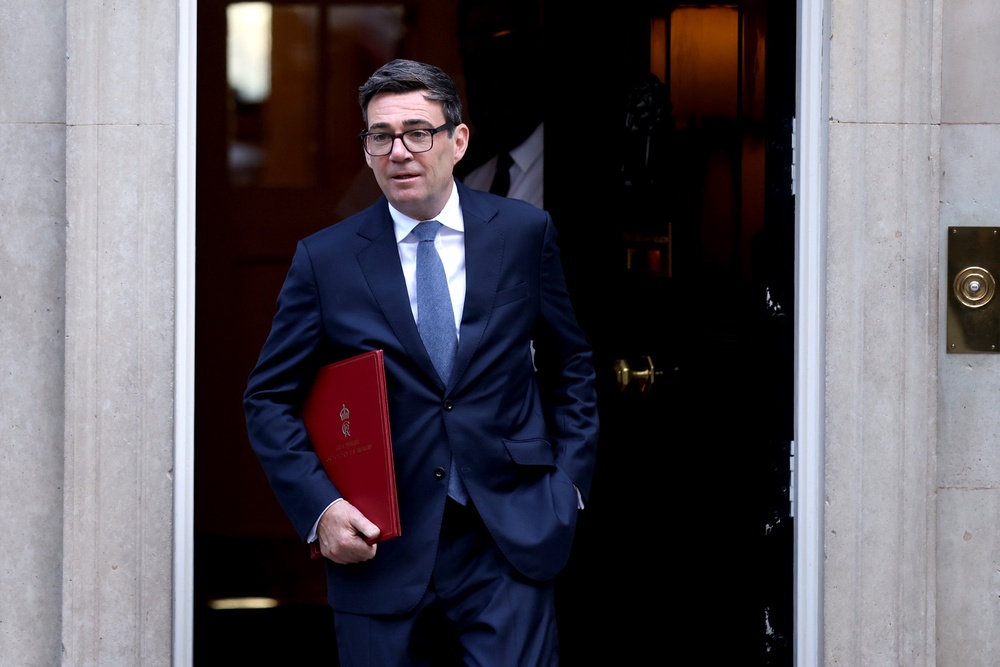 Prime minister Andy Burnham leaves 10 Downing Street to attend PMQs (Getty)