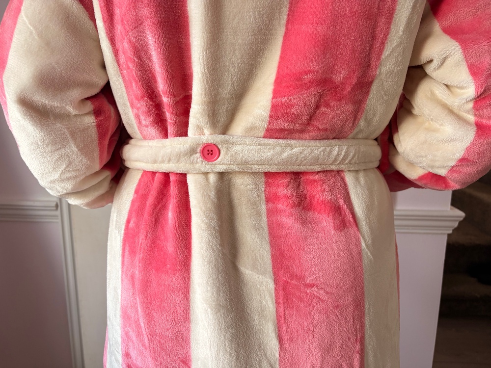 The secure button fastening is a welcome addition to the robe (Isabella Howells/The Independent)