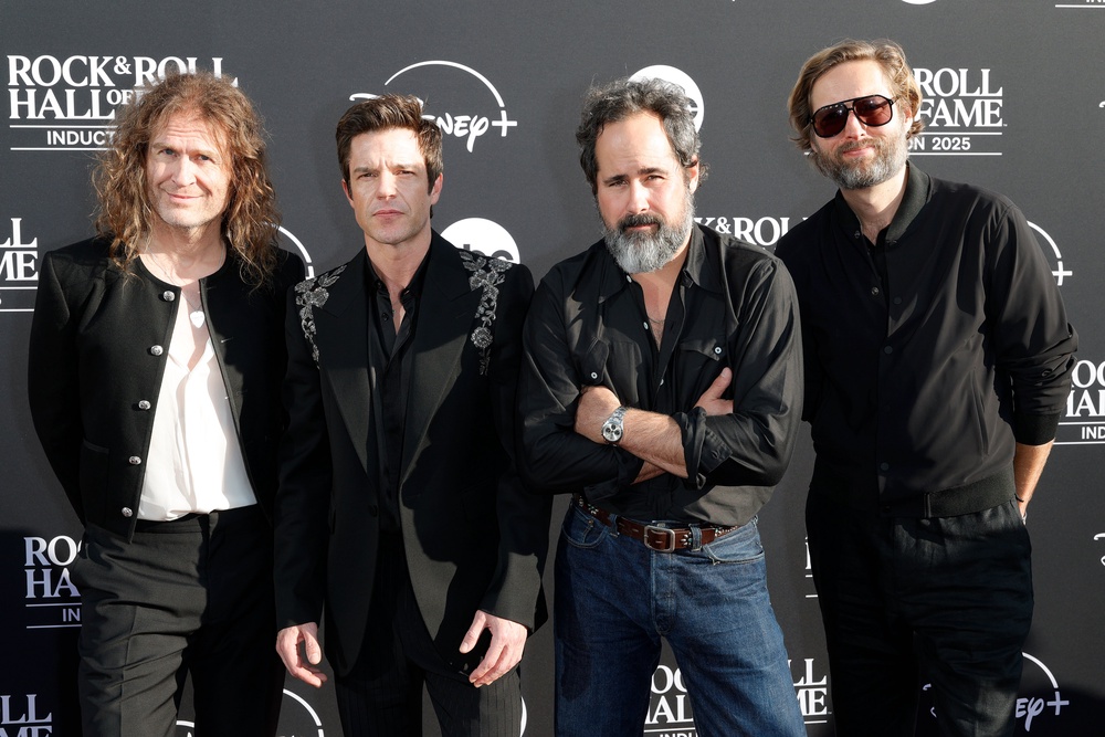 Dave Keuning, Brandon Flowers, Ronnie Vannucci and Mark Stoermer of The Killers performed at the 2025 Rock & Roll Hall of Fame ceremony (Getty)