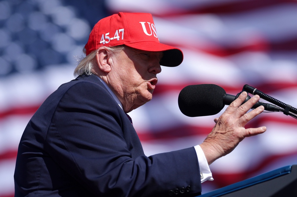 The president then threw in a slight jab: 'Elon’s 80 percent super genius and 20 percent he got a little problem; I always tell him. He’s a great guy, though' (Getty Images)