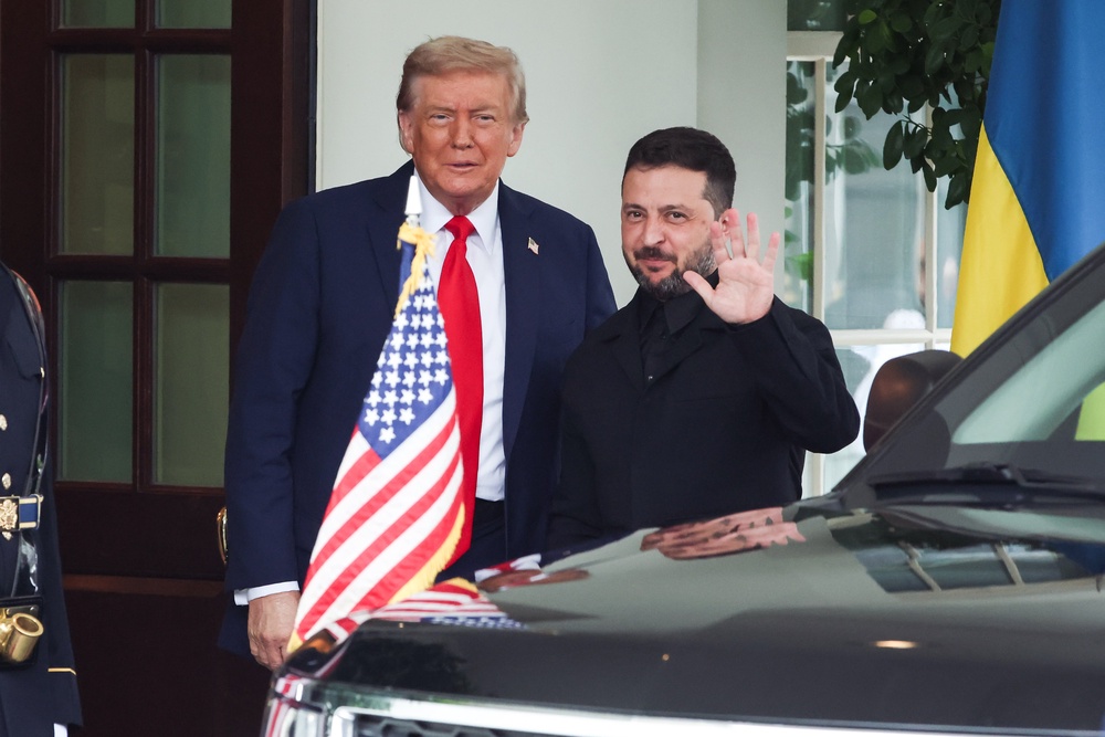 US President Donald Trump (left) welcomes Ukrainian President Volodymyr Zelensky to the West Wing of the White House last year (Samuel Corum/PA)