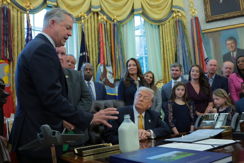 Marshall speaks as President Trump prepares to sign the 