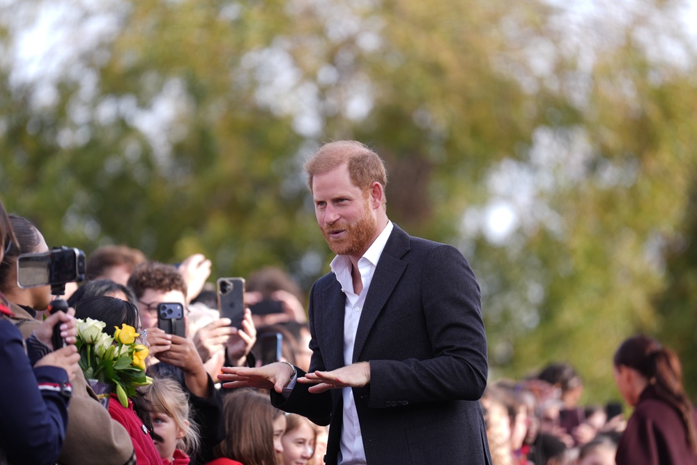 Harry chatting to the crowds (Joe Giddens/PA) (PA Wire)