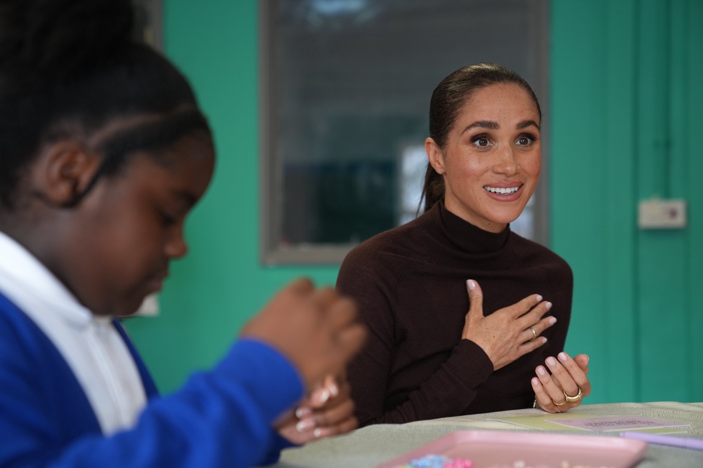 Meghan joins a jewellery making session during the visit (Joe Giddens/PA) (PA Wire)