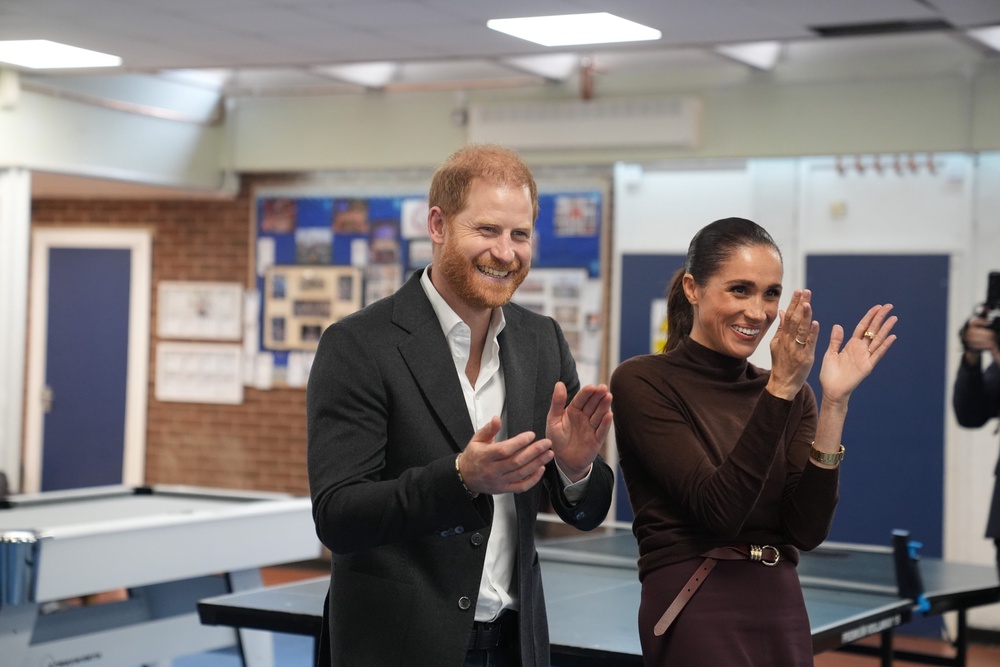 Prince Harry and Meghan pictured at Epic Partners (Joe Giddens/the Press Association)