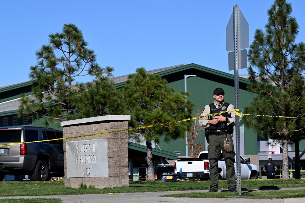 Details are beginning to emerge about the shooting in Bend, Oregon, where a 16-year-old gunman forced his way into Silver Rail Elementary School on Thursday afternoon and opened fire, killing three young children and a teacher before being fatally shot (AP Photo/Joe Kline)