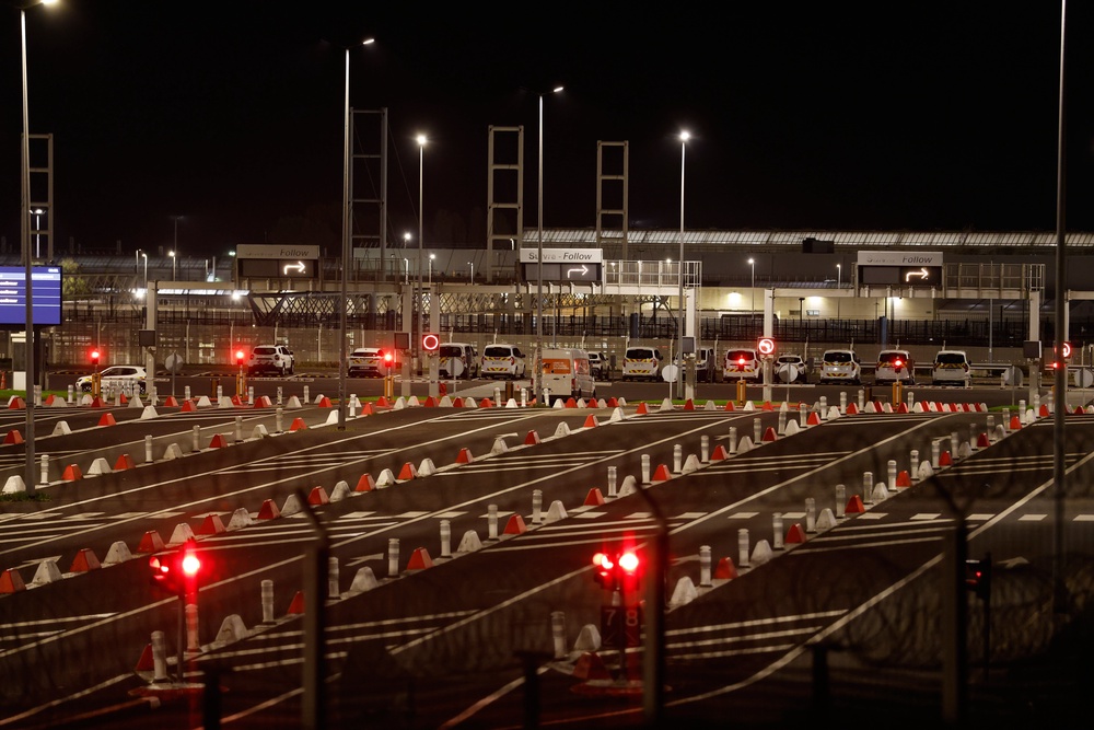 The Eurotunnel terminal site is pictured after a shuttle bus crashed into a stationary freight train inside the Channel Tunnel’s secure loading terminal in Coquelles (AP Photo/Jean-Francois Badias) (AP)