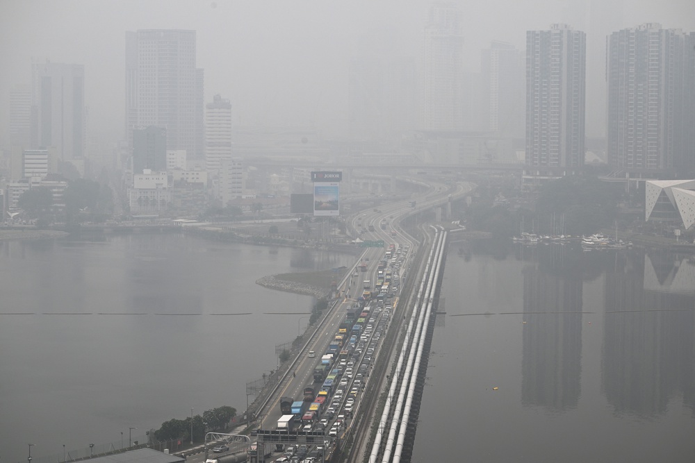 Buildings across the causeway of the southern state of Johor are shrouded with haze (AFP/Getty)
