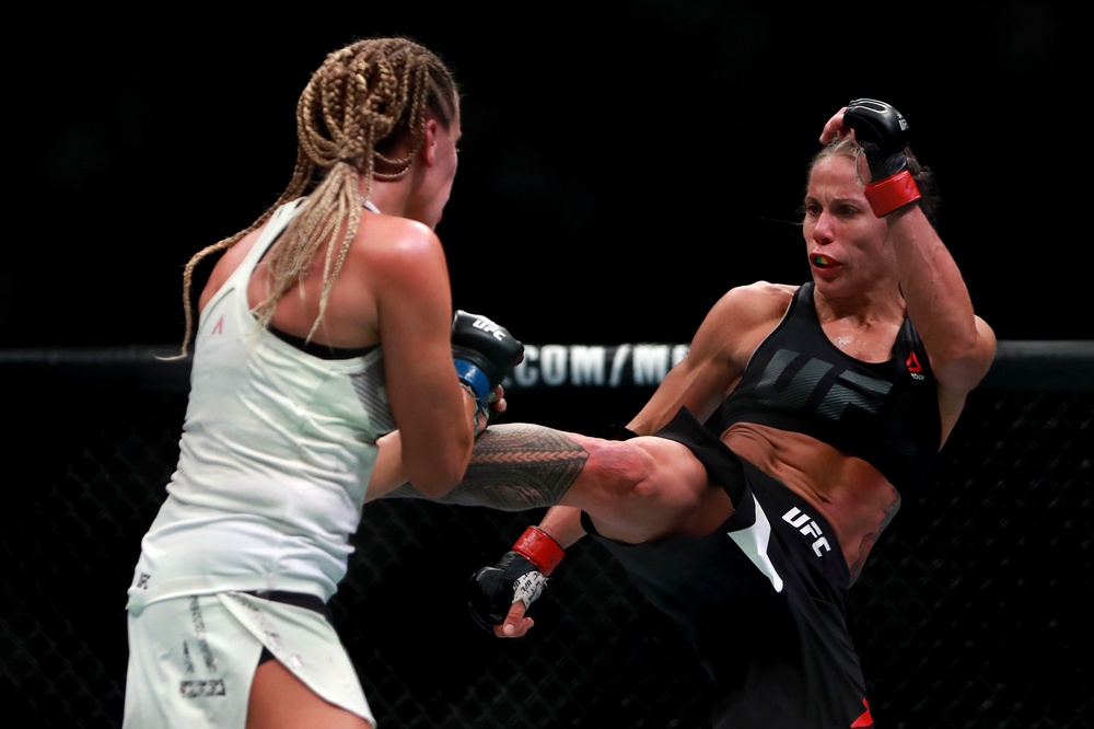 Liz Carmouche of the United States (right) fights against Katlyn Chookagian of the United States at UFC 205 (Getty)