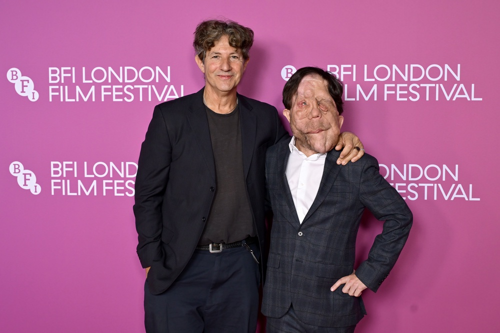 Oscar-winning director of ‘Under the Skin’ and ‘Zone of Interest’ Jonathan Glazer and Adam Pearson pictured at the London Film Festival (Getty)