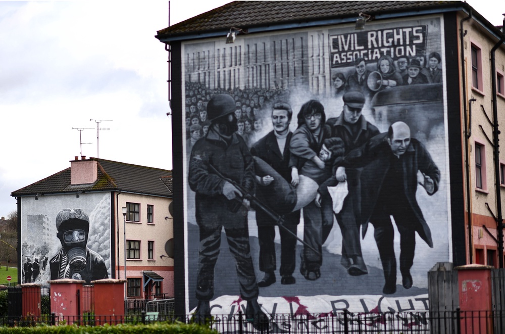 Republican murals pictured in the Bogside area of Derry in 2017 (BEN STANSALL/AFP via Getty Images)