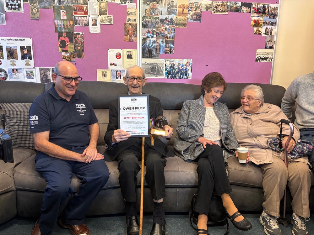 Owen Filer, believed to be Wales' oldest man, celebrates with friends, family, and fellow veterans at the Tredegar Veterans Support Hub, ahead of his 107th birthday. (PA)