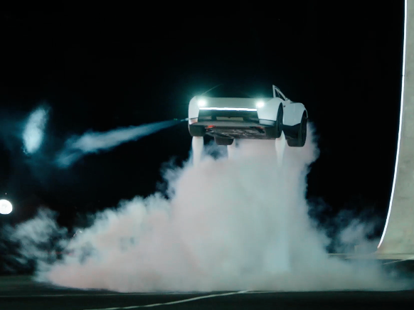 Tesla Roadster uses rocket boosters to flip and fly through the air (Tesla)
