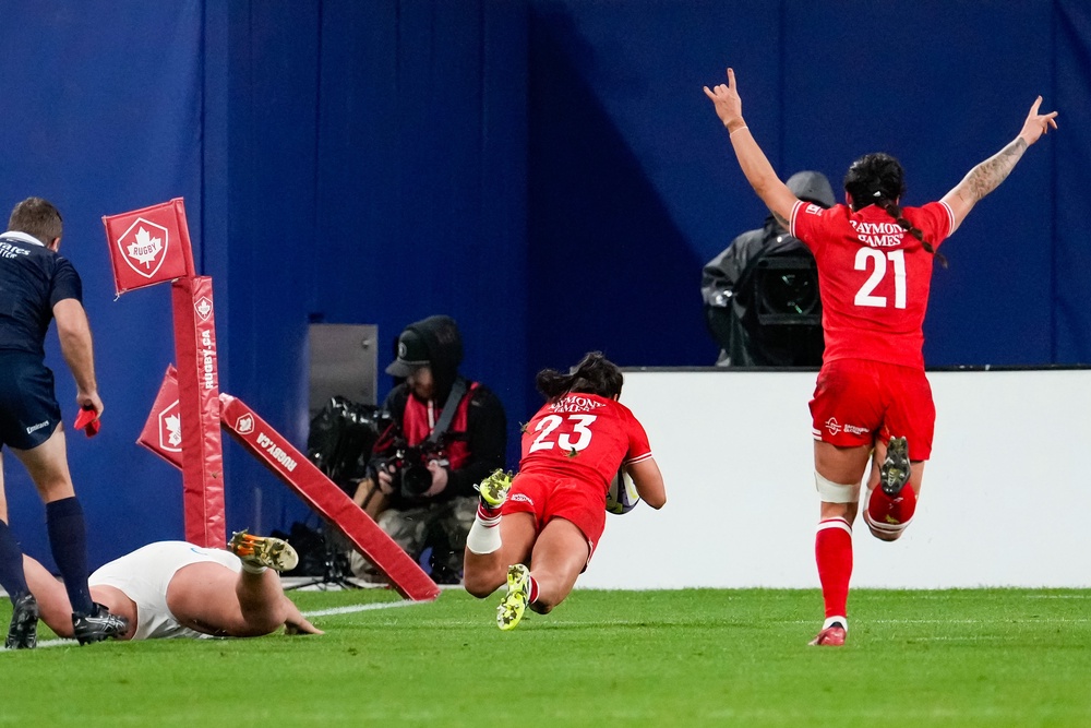 Canada's Shoshanah Seumanutafa (23) dives to make a try (AP)