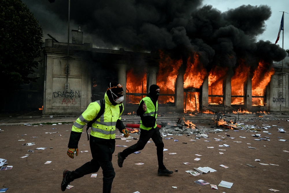 The tourism office in Lyon has been set on fire (AFP/Getty)