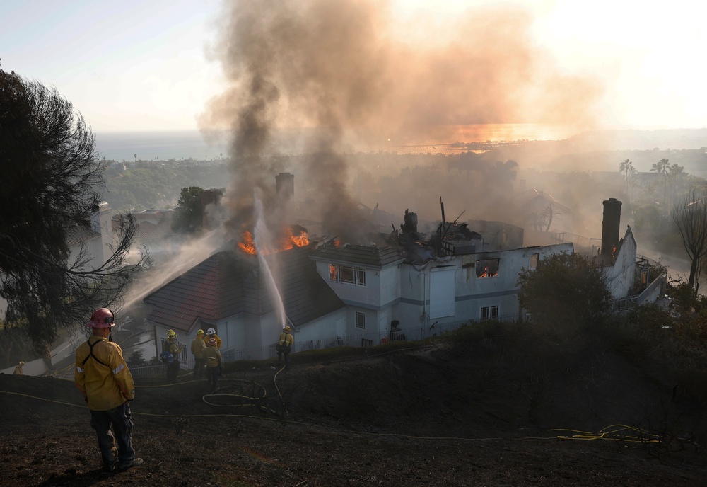 The Norte Fire has burned nearly 500 acres and destroyed multiple structures in a matter of hours, as high winds have aggressively pushed it into neighborhoods (Getty)