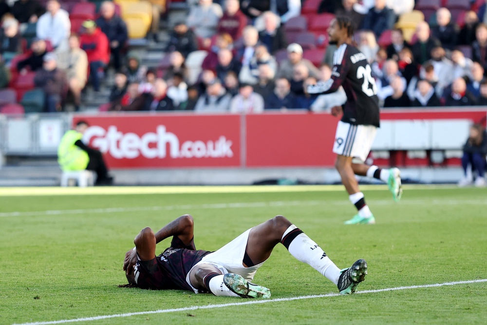 Jeremy Jacquet of Liverpool reacts after clashing with Yehor Yarmolyuk of Brentford (Getty)