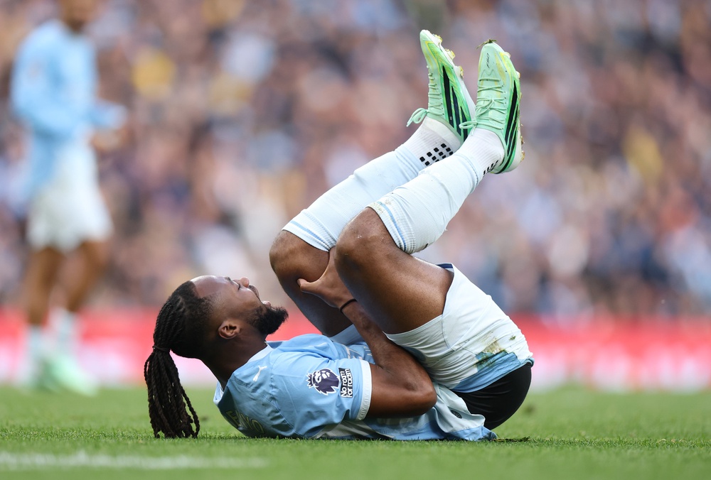 Antoine Semenyo of Manchester City holds his leg after picking up an injury (Getty)