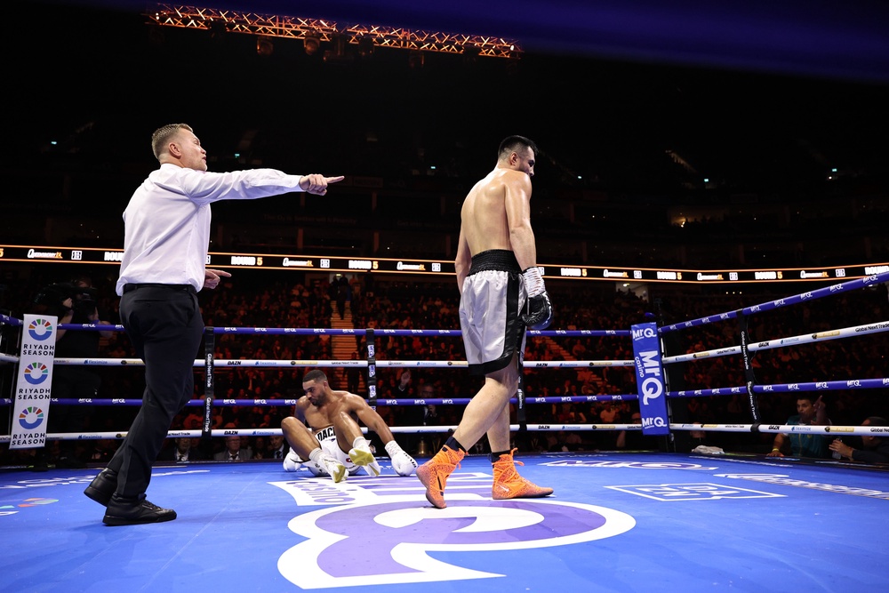 Solomon Dacres is knocked down by Bakhodir Jalolov in the fifth (Queensberry Promotions)