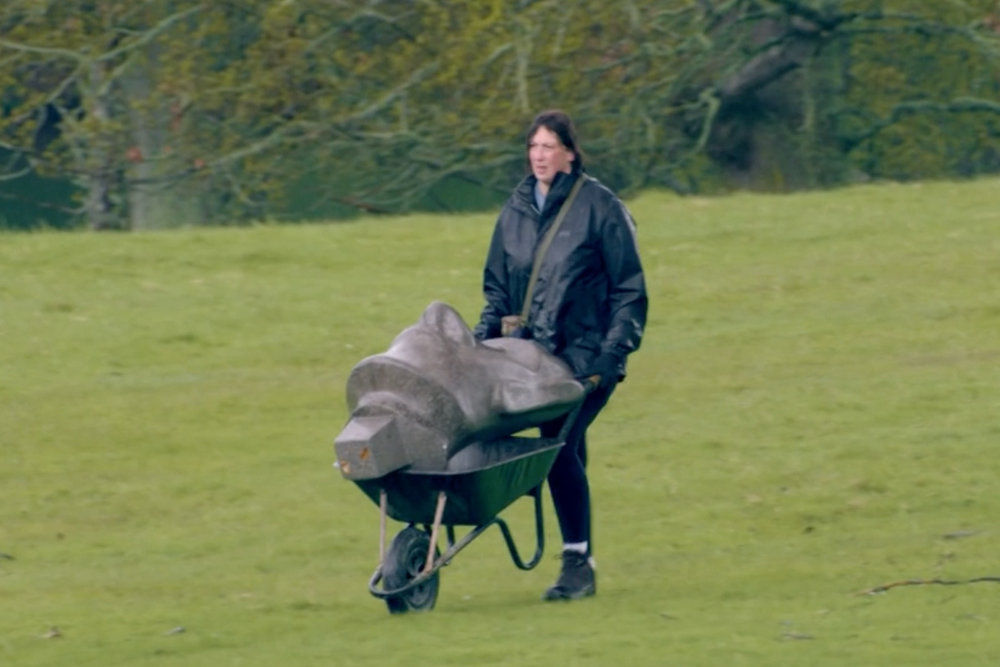 The latest ‘Traitors’ task saw Hart transporting an enormous head up a hill (BBC)