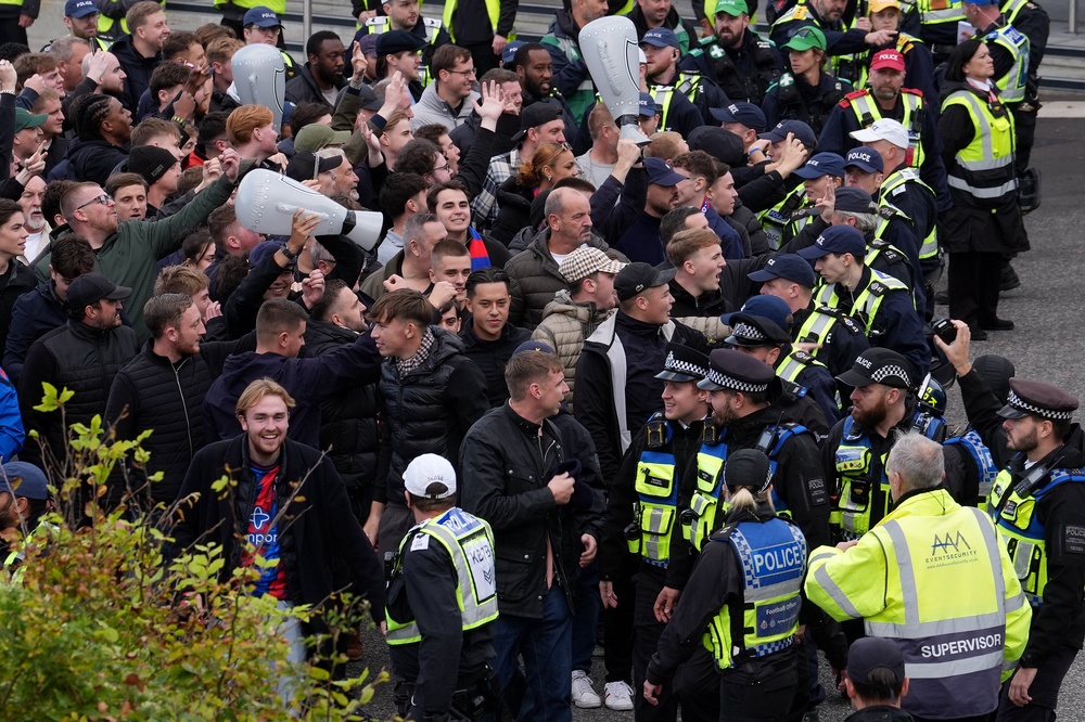 Crystal Palace fans taunted Brighton supporters with inflatable trophies before the match (Gareth Fuller/PA)