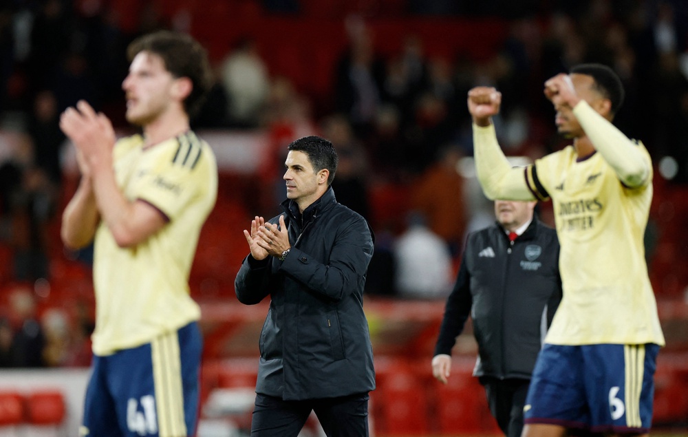 Mikel Arteta applauds the Arsenal fans at full-time (Reuters)