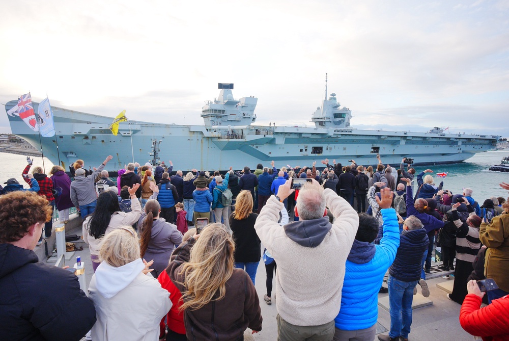Crowds gather, as HMS Prince of Wales leaves Portsmouth Naval Base to lead The UK Carrier Strike Group on deployment to the Arctic and North Atlantic, on Operation Firecrest, which will focus on operational readiness, training, and strengthening NATO interoperability (PA)