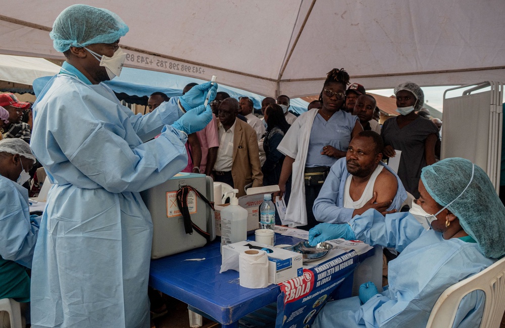 Health workers and humanitarian responders on the front lines of the Ebola response gather to receive a vaccination due to their potential exposure to the virus as part of their work with suspected cases, including contacts, as aid agencies intensify efforts to contain the Ebola outbreak involving the Bundibugyo strain, in the North Kivu Province of the Democratic Republic of the Congo, October 16, 2026 (Reuters)