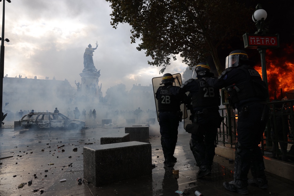Police officers at Place De La Republique in Paris (PA)