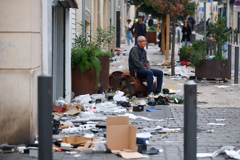 The scene the day after clashes during a national day of demonstrations against the cost of living and rising fuel prices in Marseille (Reuters)