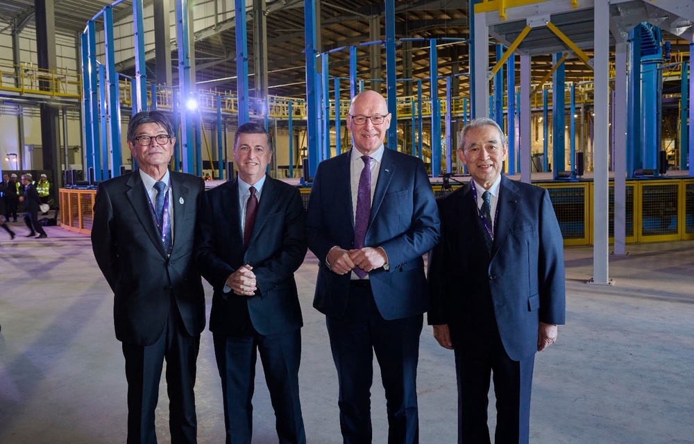 Scottish Secretary Douglas Alexander (middle left) and First Minister John Swinney (middle right) attended the opening of the factory (Sumitomo/PA)