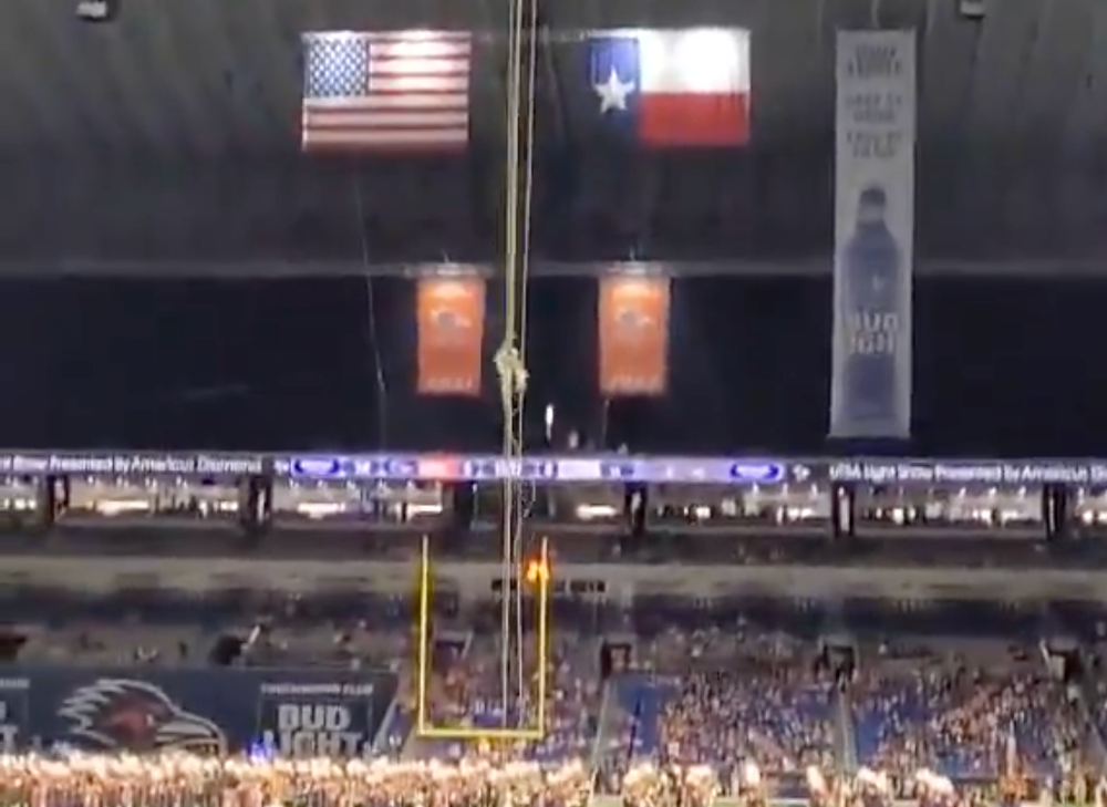 Members of the crowd were filming the pre-game demonstration when the airman fell (X/@MLFootball)