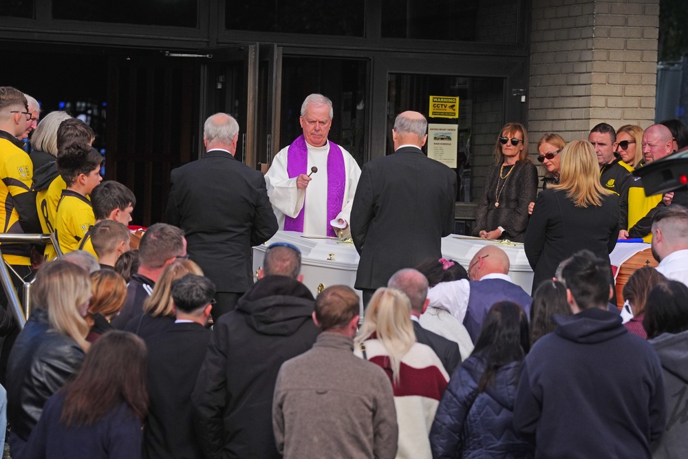 The coffins were brought to Sacred Heart Church in Waterford on Sunday afternoon, where the bodies were laid in repose for family, friends and community members to come to pay their respects. (PA)