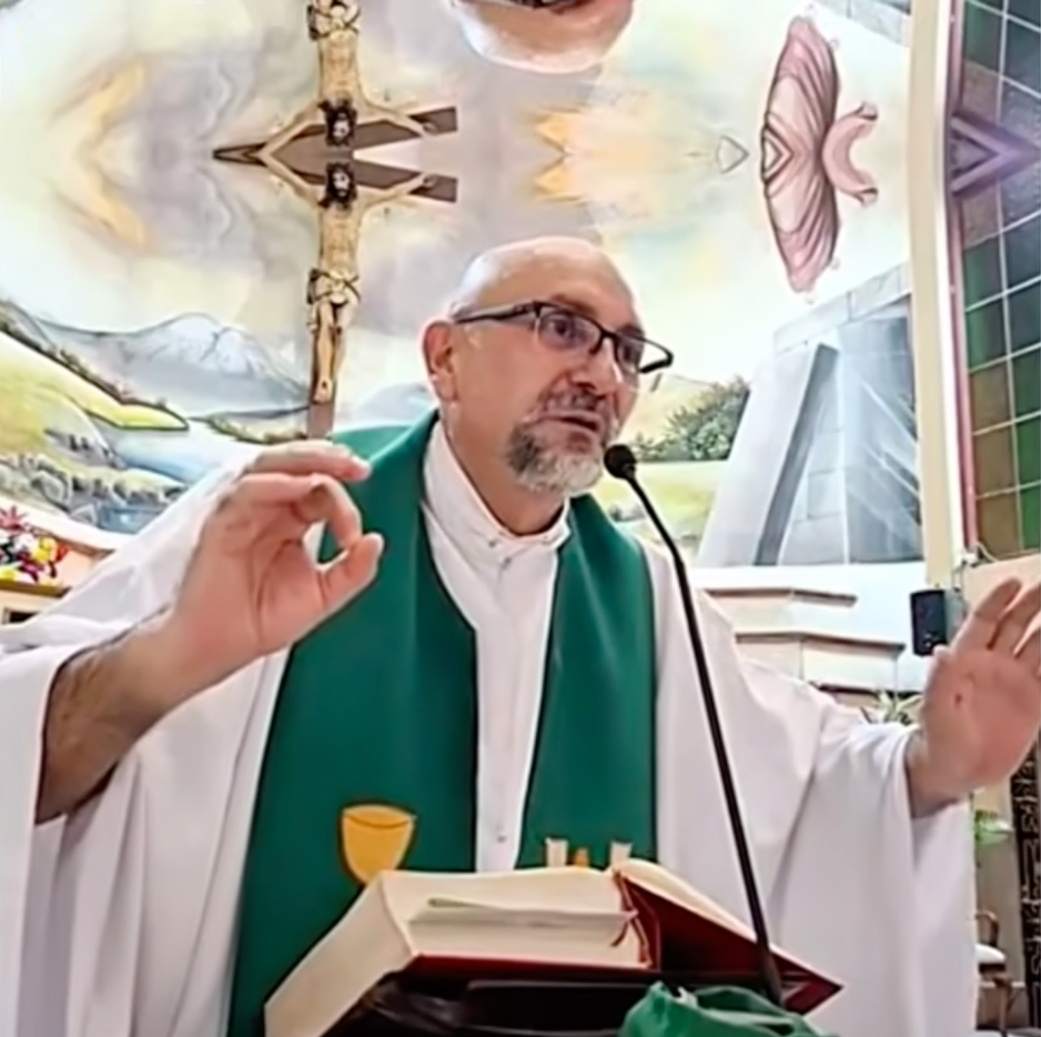 The priest was hosting evening mass when he was hit by the cross on the wall behind him (Facebook / Patricio Sanchez)