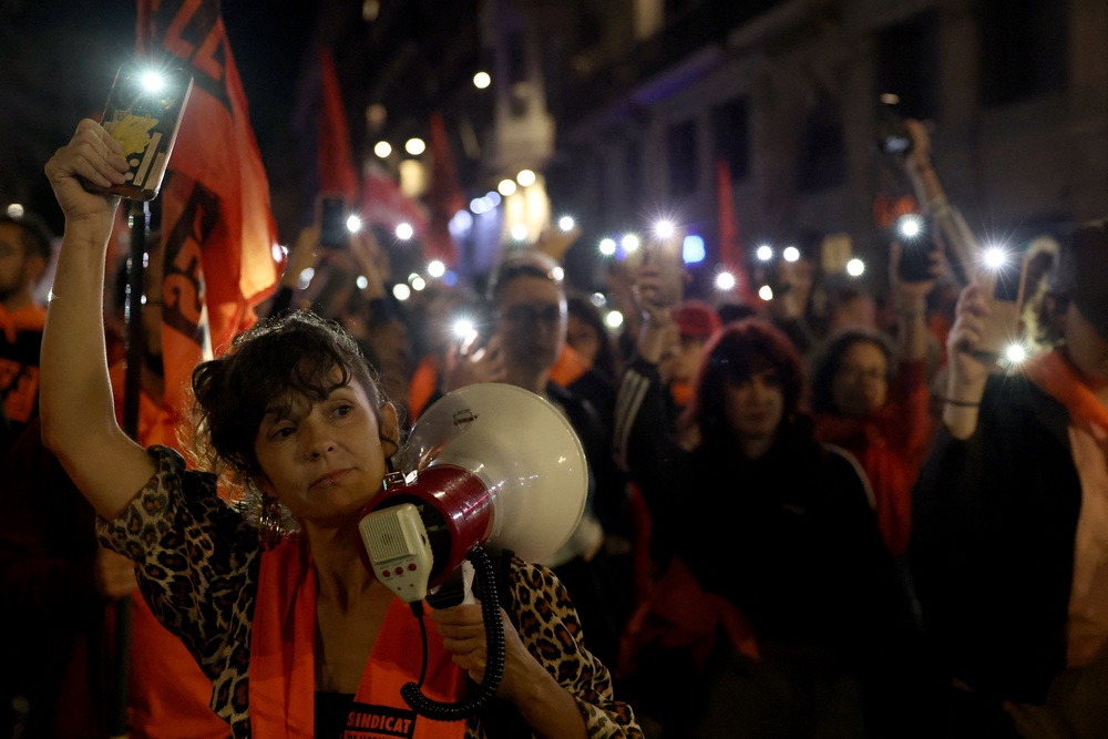 Demonstrators gather to pay tribute to Maricarmen Abascal, the 87-year-old pensioner whose eviction triggered nationwide protests over Spain's chronic housing crisis. (AFP/Getty)