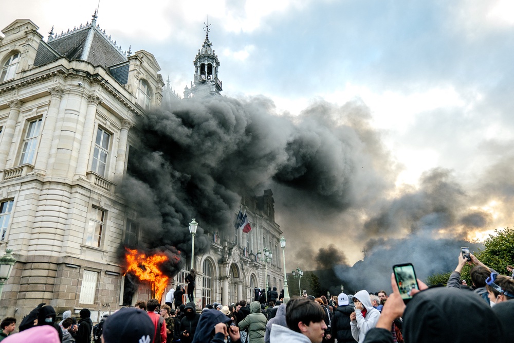 Protesters set fire to the town hall in Limoges Haute-Vienne at the weekend, as violent demonstrations spread across the country (AFP/Getty)