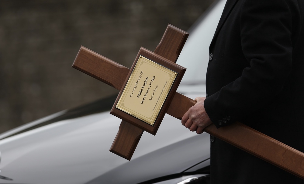 A cross is carried ahead of the funeral of Philip and Kim English and their sons, Jayden and Callum (Evan Treacy/PA) (PA Wire)