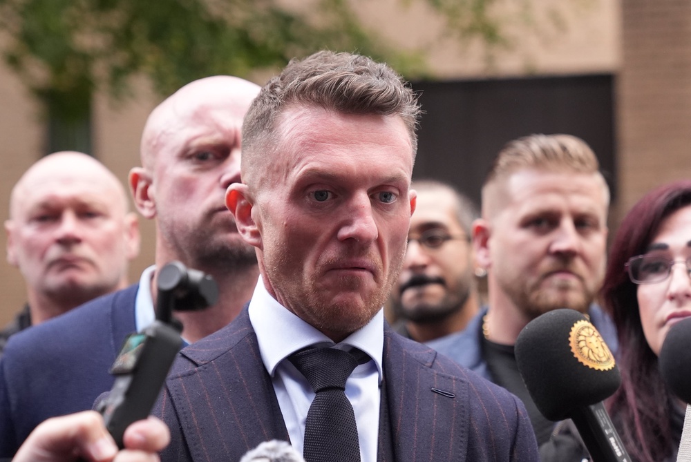Tommy Robinson, whose real name is Stephen Yaxley-Lennon, outside Southwark Crown Court, south London, where he is charged with the harassment of two journalists between August 5 and 7 2024. Picture date: Monday October 19, 2026. (PA)