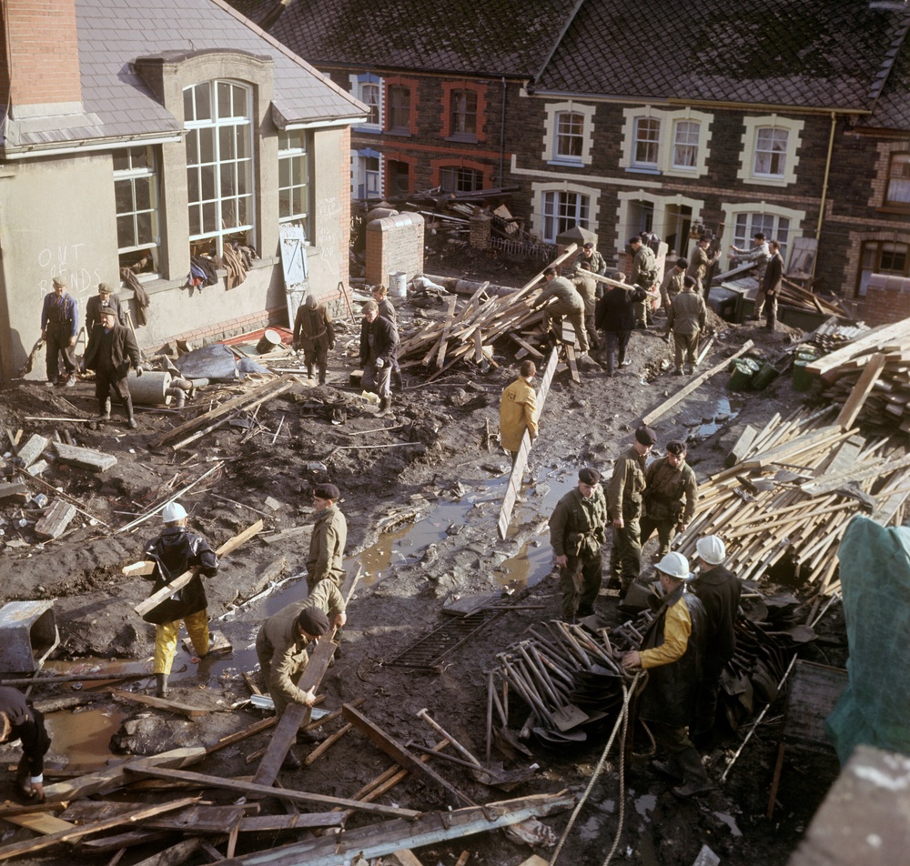 Soldiers and miners at work amid the wreckage in the aftermath of the disaster (PA)