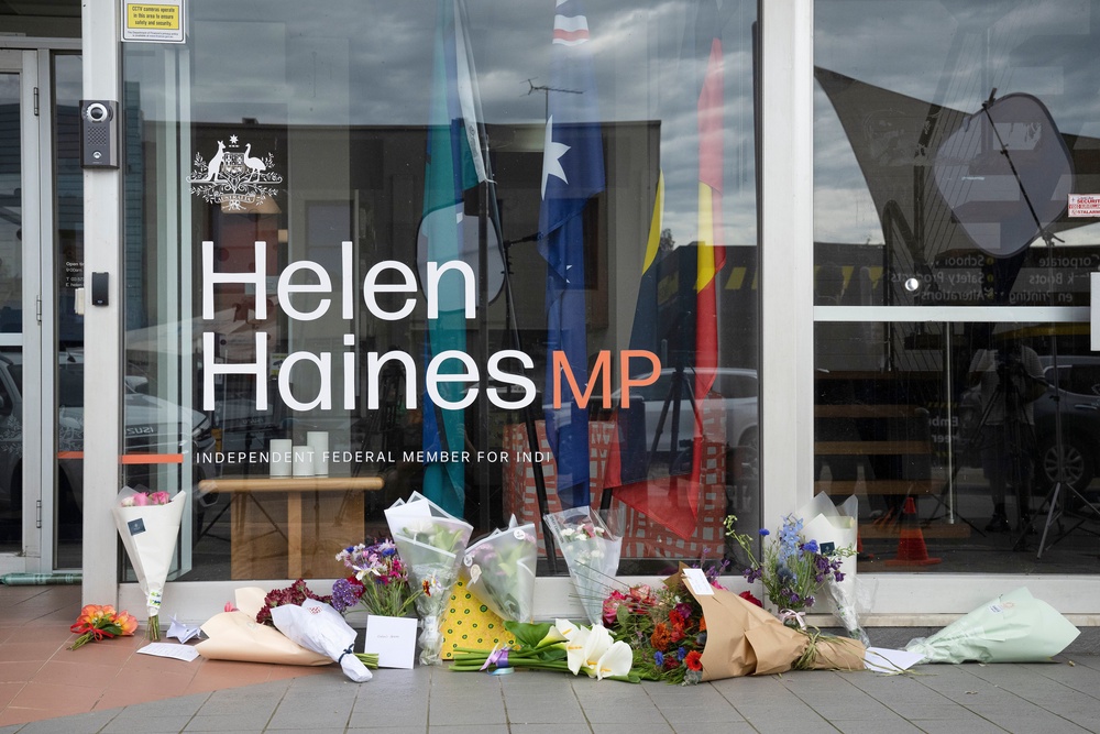 Tributes and flowers are placed outside the electoral office for independent member of parliament Helen Haines in Wangaratta, Australia, Tuesday, 20 October 2026 (AP)