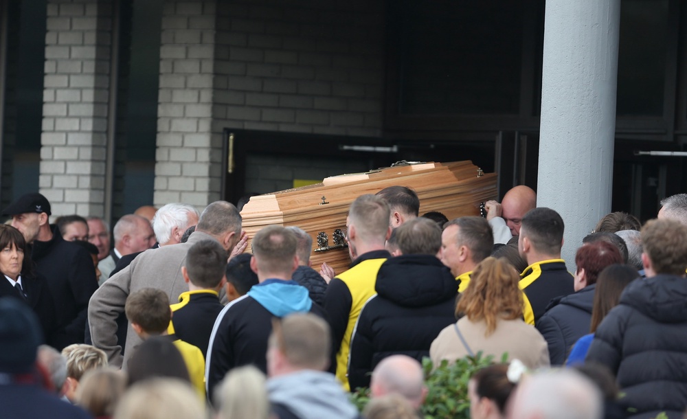 One of the coffins is carried into the church ahead of the funeral of Philip and Kim English and their sons, Jayden and Callum, at the Sacred Heart Church Parish Centre, (PA)