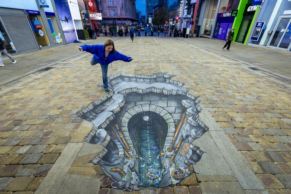 Martha Kinnes views Under Our Feet, an installation created by artists 3D Joe & Max in Manchester (James Speakman/Assignments/the Press Association) (PA Wire)
