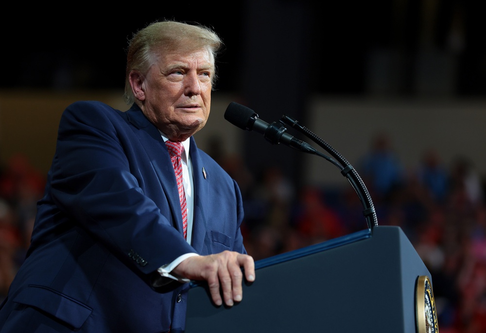 'Whatever you do, get out and vote so we can get rid of idiots like that,' Trump said in Park City Monday night after being interrupted by demonstrations, adding, 'It never ends' (Getty Images)